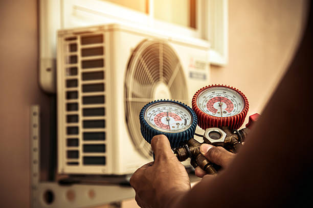 Professional Hvac technician working in Port Salerno, FL